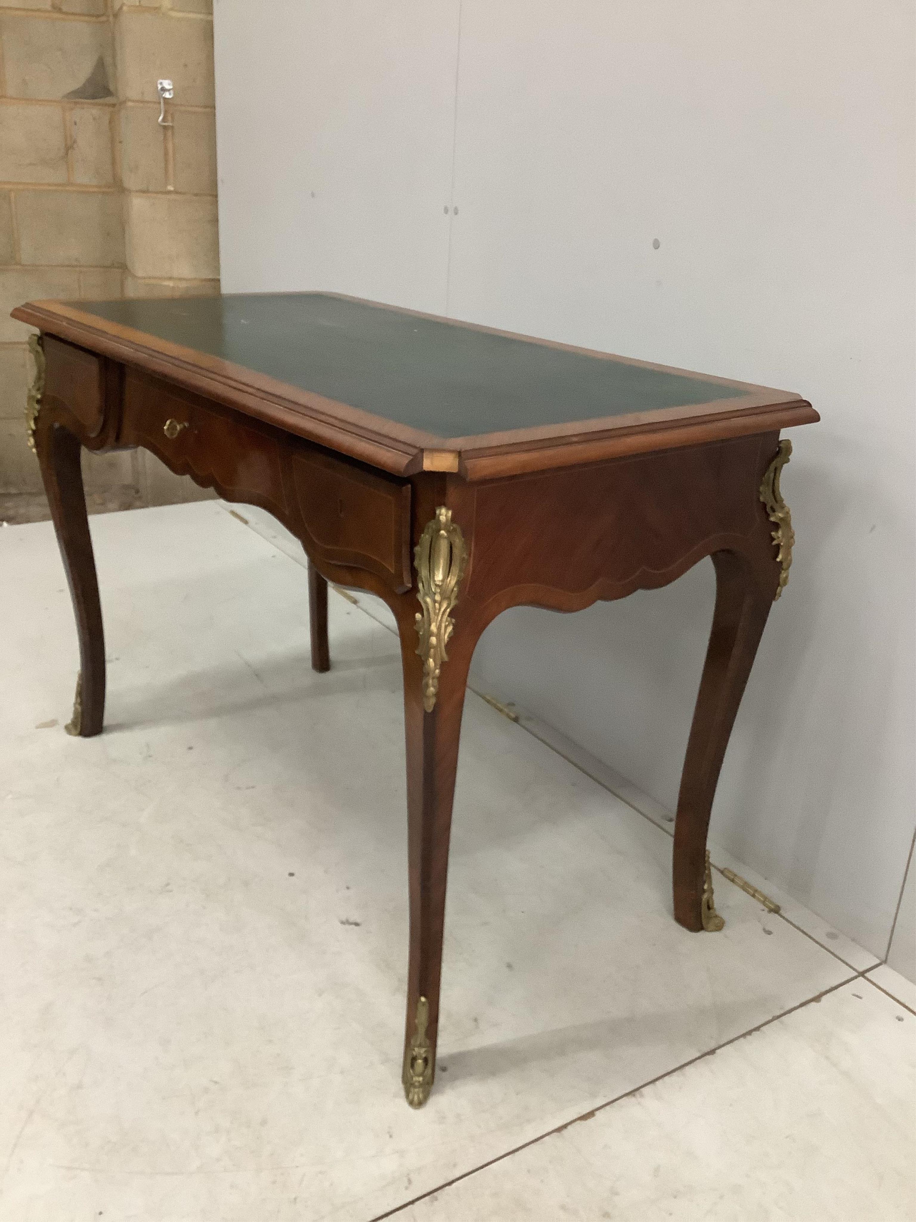 A French gilt metal mounted kingwood bureau plat, width 113cm, depth 60cm, height 77cm. Condition - fair, pieces of corner moulding are missing